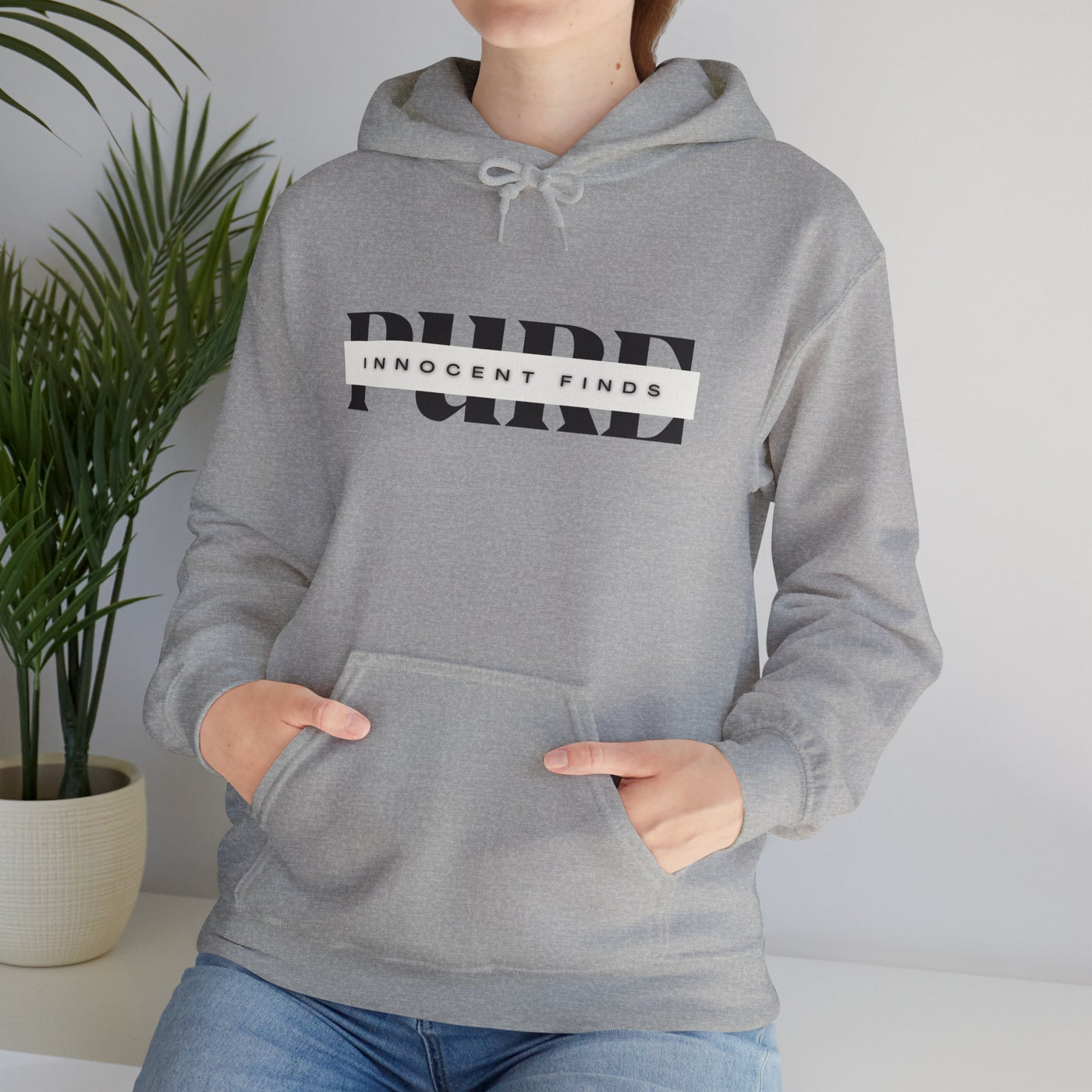 Pure Innocent Finds Unisex Heavy Blend™ Hooded Sweatshirt, Black Design